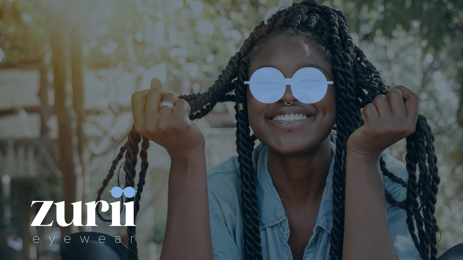 Zurii Eyewear brand mark over a portrait of a woman wearing round Zurii sunglasses